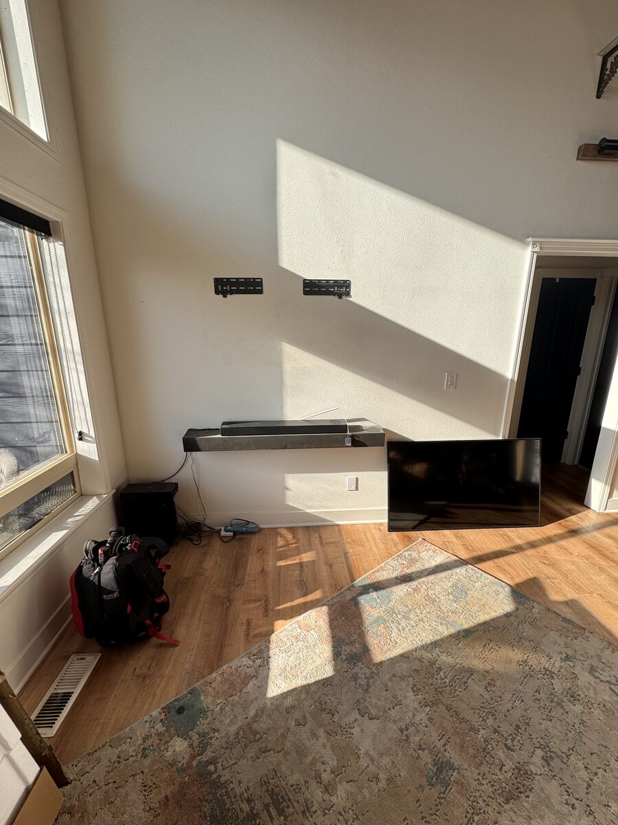 Before photo showing wall mount placement for a Frame TV and soundbar setup in the Treasure Valley
